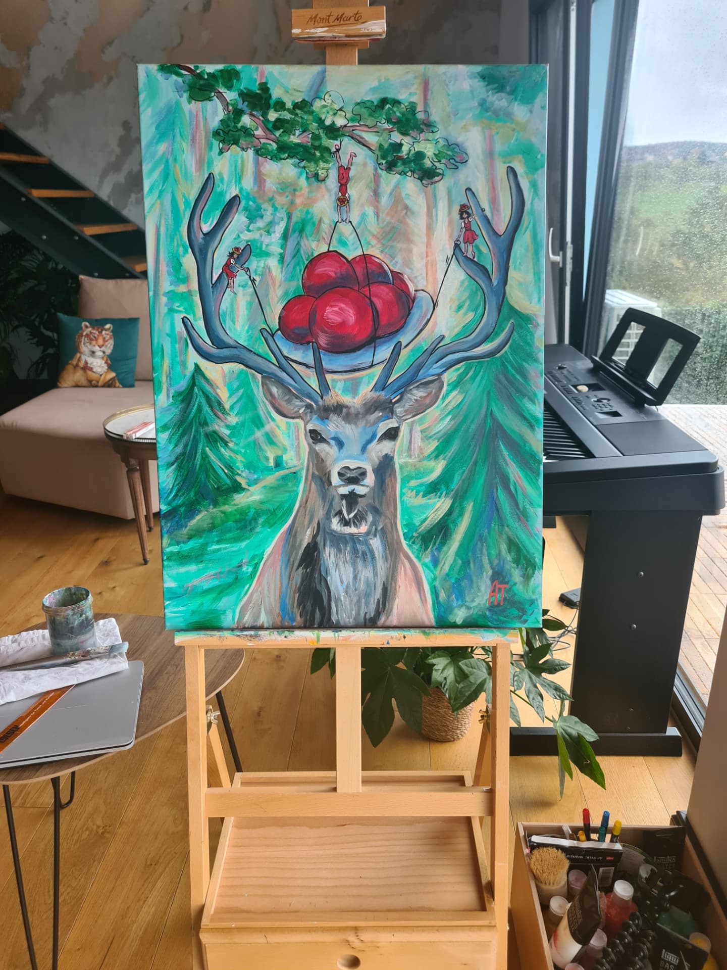 À l'atelier — la toile sur le chevalet