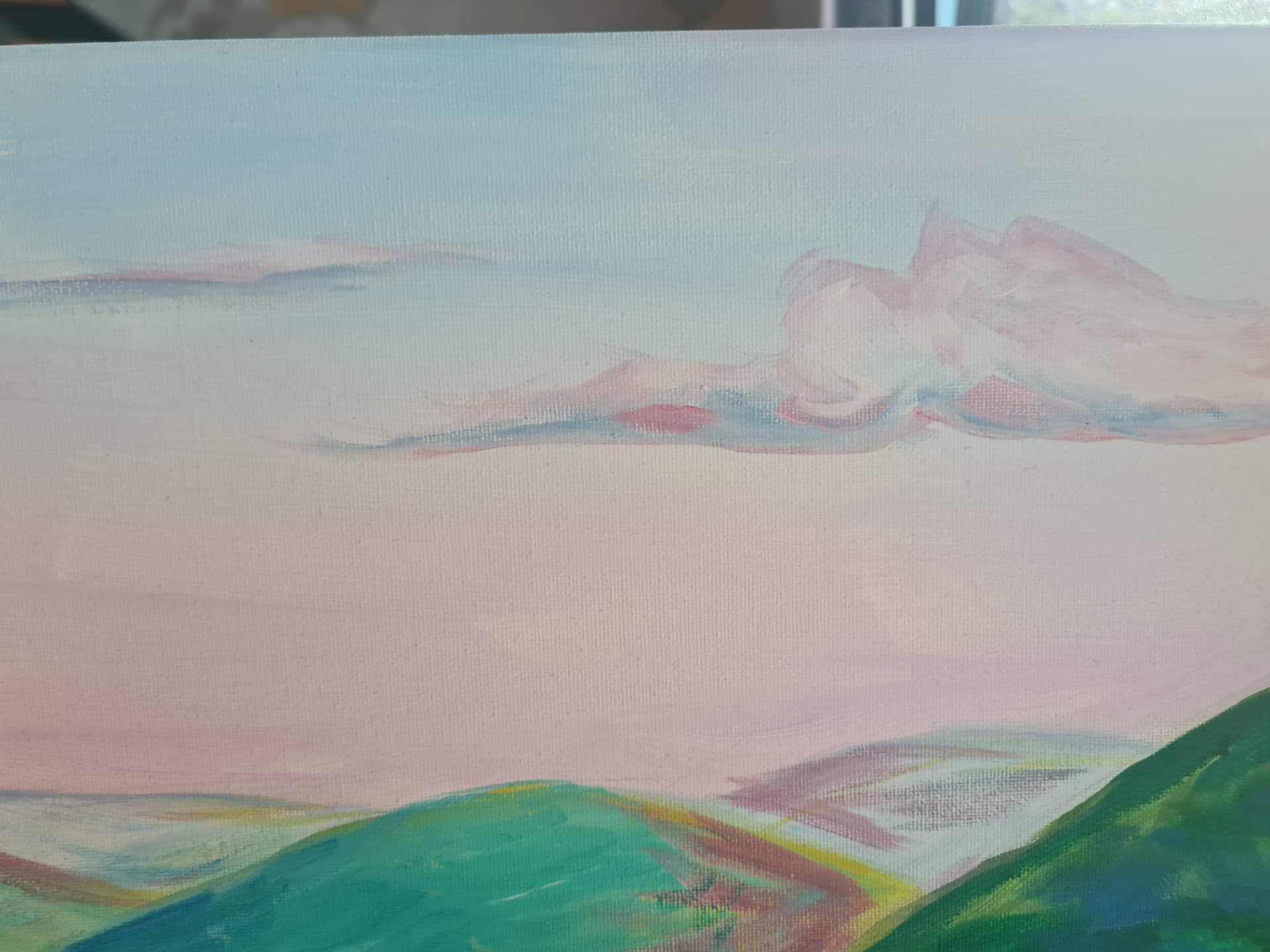 Détail — le nuage rose, presque un visage